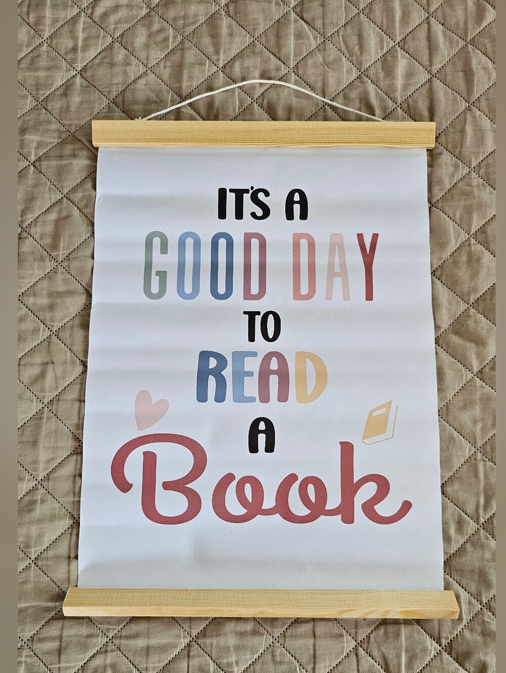 It's a good day to read a book wall art print with multicolored text and small b